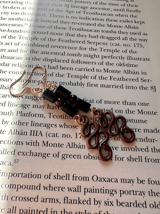 Obsidian and garnet serpent earrings